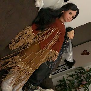 Porcelain Native American doll